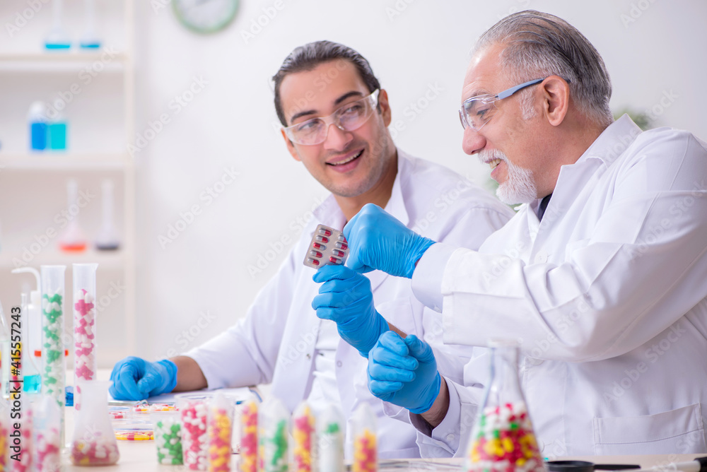 Two chemists working in the lab