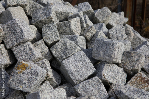 A pile of granite stones for construction.