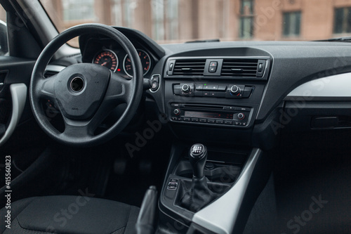 Modern car interior with the leather panel, and dashboard