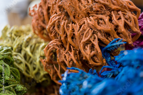 Fototapeta Naklejka Na Ścianę i Meble -  Colored dried seaweed shaped into decorative balls