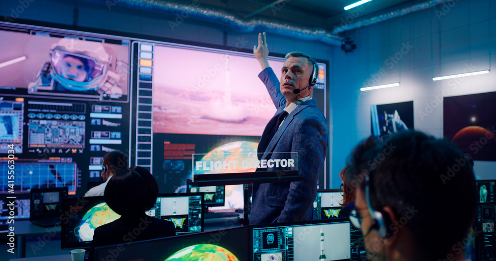 Fototapeta premium Boss and team launching spacecraft in office