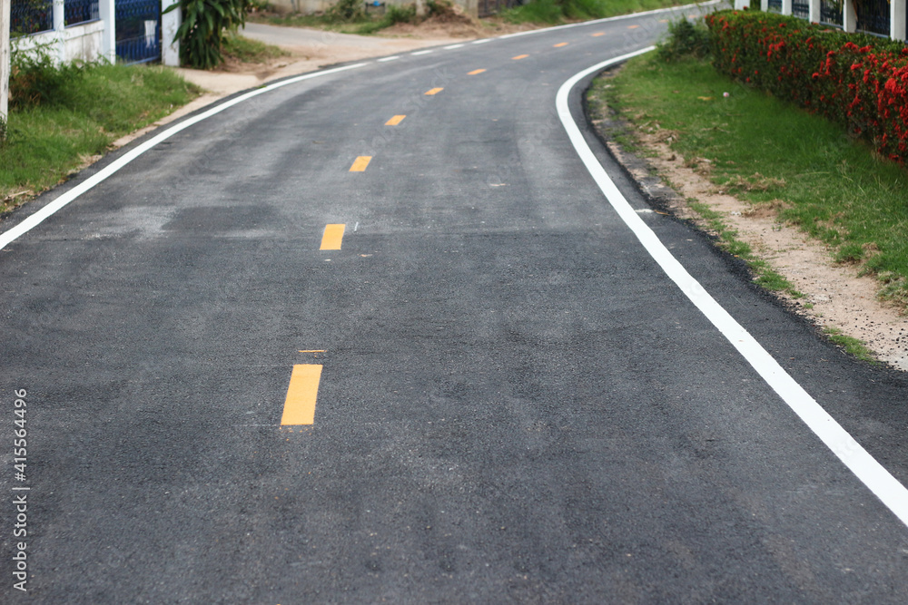 black asphalt winding road transport with white and yellow line black asphalt winding road transport with white and yellow line