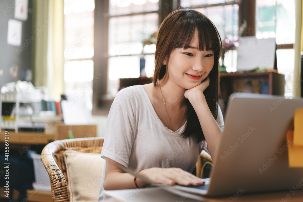 Young adult asian woman business working and study at home when virus covid-19 pandemic. Young adult asian woman business working and study at home when virus covid-19 pandemic.