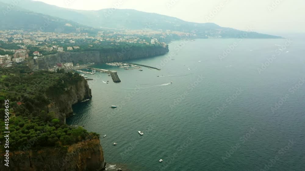 Aerial view of the small harbour of Meta di Sorrento, located in the Gulf of Naples along the Sorrento coast, Italy. Aerial view of the small harbour of Meta di Sorrento, located in the Gulf of Naples along the Sorrento coast, Italy.