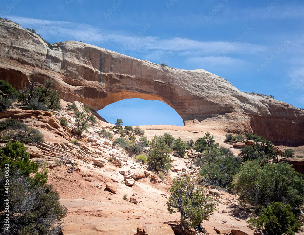 Astounding Wilson Arch Trail in a semi desert landscape in Moab Utah during summer