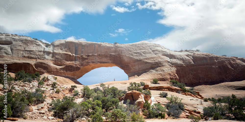 Fototapeta premium Astounding Wilson Arch Trail in a semi desert landscape in Moab Utah during summer