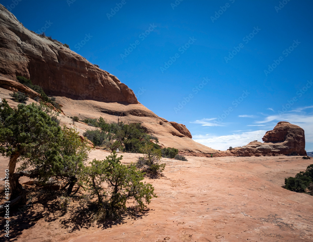 Fototapeta premium Astounding Wilson Arch Trail in a semi desert landscape in Moab Utah during summer