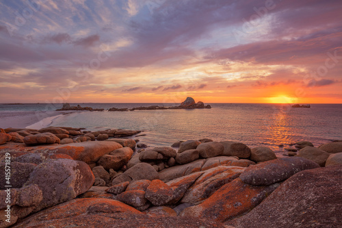 Beautiful, colourful ,autumn sunrise over Picnic Rocks. Mount William National Park. Part of the Bay of Fires Conservation Area. North Eastern Tasmania, Australia.