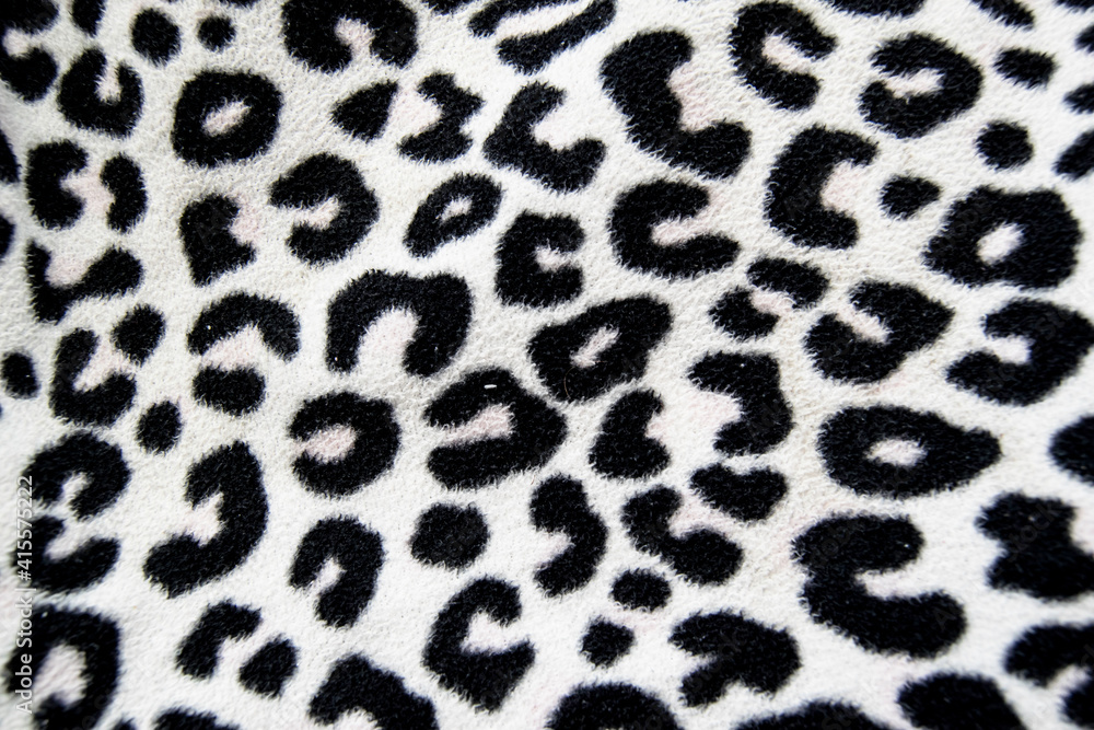 Background and detail of beige fabric texture and animal print drawings. Design elements. Background and detail of beige fabric texture and animal print drawings. Design elements.
