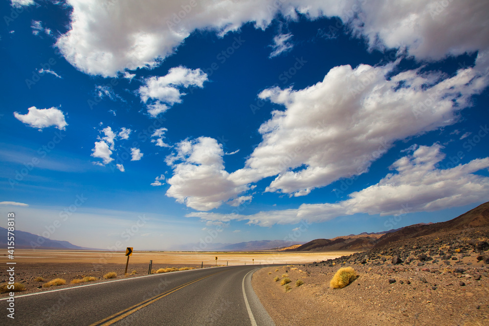 Scenic panorama of highway in the middle of desert