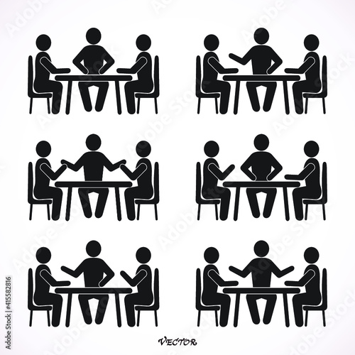 Group of business people having a meeting around a conference table