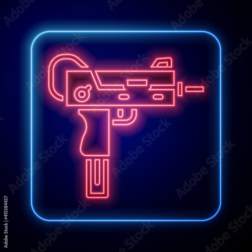 Glowing neon UZI submachine gun icon isolated on blue background. Automatic weapon. Vector.