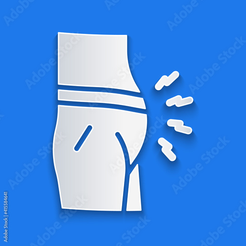 Paper cut Abdominal bloating icon isolated on blue background. Constipation or diarrhea. Paper art style. Vector.