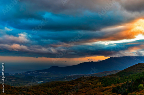 sunset over the hills and the sea in crimea on an autumn evening