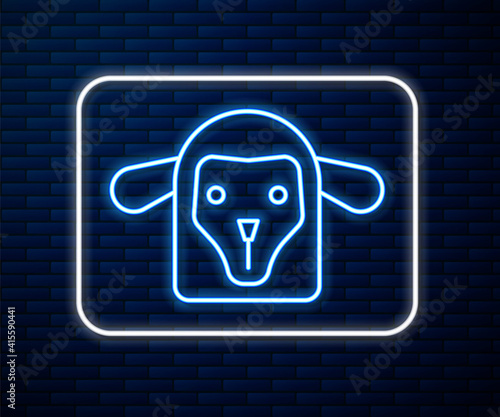 Glowing neon line Sheep head icon isolated on brick wall background. Animal symbol. Vector.