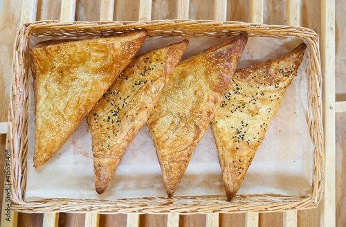 Uzbek Samsa or Sambousak in national plate photo