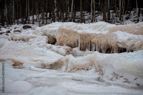  Ice formations at Baltic sea coast. Full of ice winter sea coast in Europe. Natural outdoor seascape with frozen ice formations. Ice covered Baltic sea coast. Frozen ice on a sunny day. Scenic view