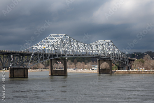Historic O'Neal Bridge a cantilevered warren truss steel bridge over the Tennessee River with dramatic sky