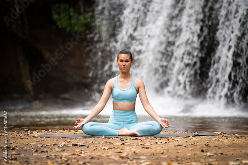 Yoga Life Balance Woman Exercise. Girl adventure fit practicing yoga pose balance body vital zen meditation in nature sky mountains Landscape
