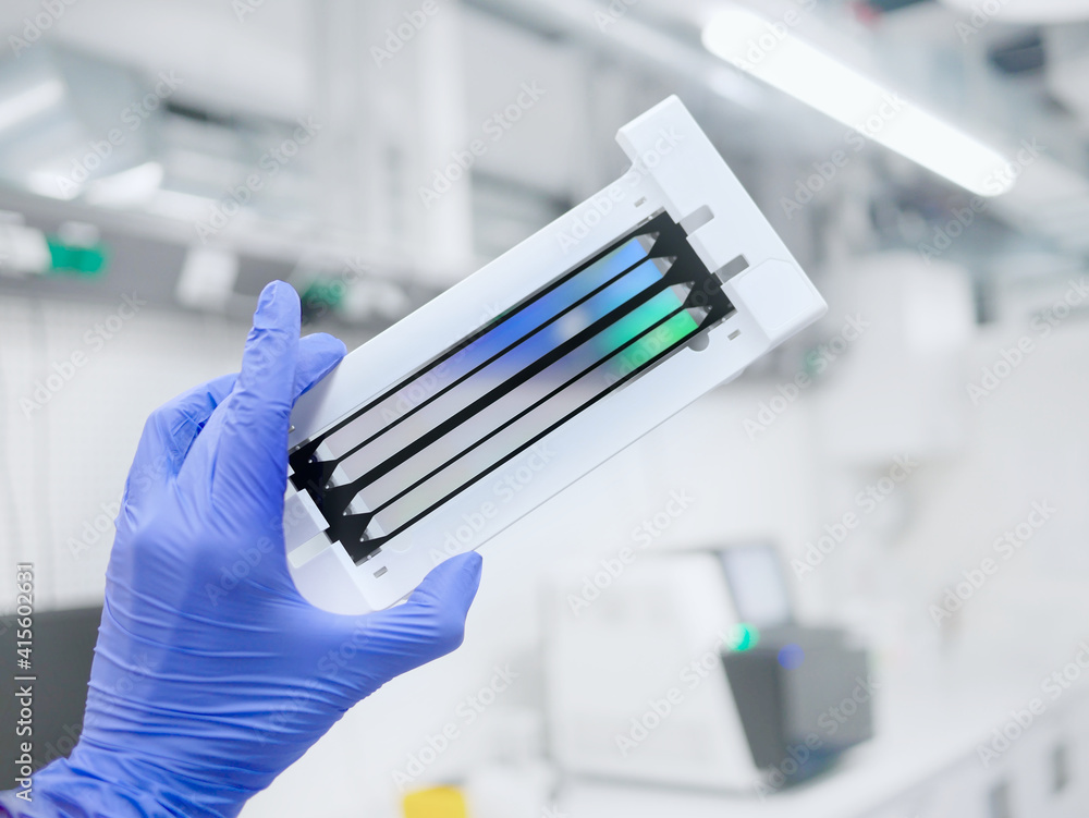 next generation sequencing flow cell. genetic engineering, genetic modification, designer baby and cloning concept. cancer screening and medical technology and therapy