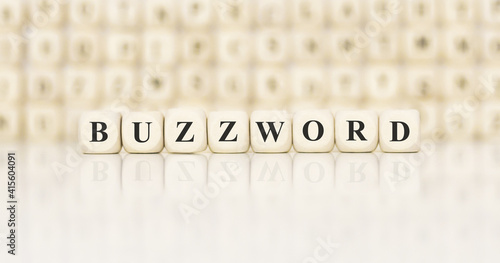 Word BUZZWORD made with wood building blocks photo