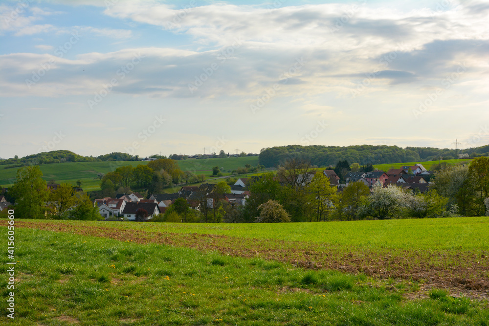 Obraz premium The village of Krombach in Lower Franconia is embedded in the landscape