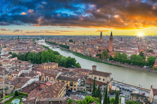 Verona Italy, high angle view sunset city skyline at Adige river