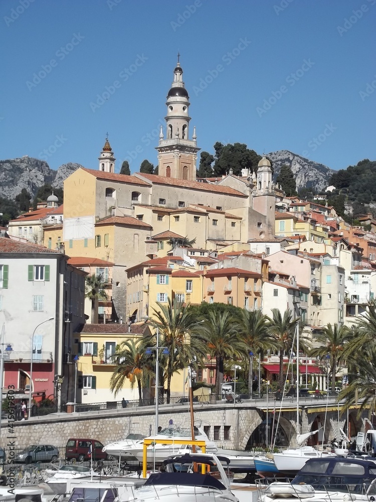 View Menton, the old town of Menton, France, with the dominating cathedral of st. michel