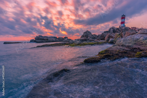 Canvas Print lighthouse at sunset