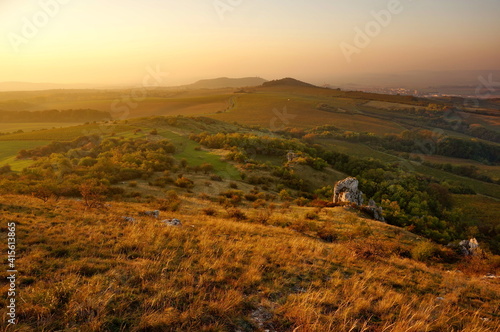 Grassy mountainside of a mountain Tabulová hora in Czech republic in the early morning