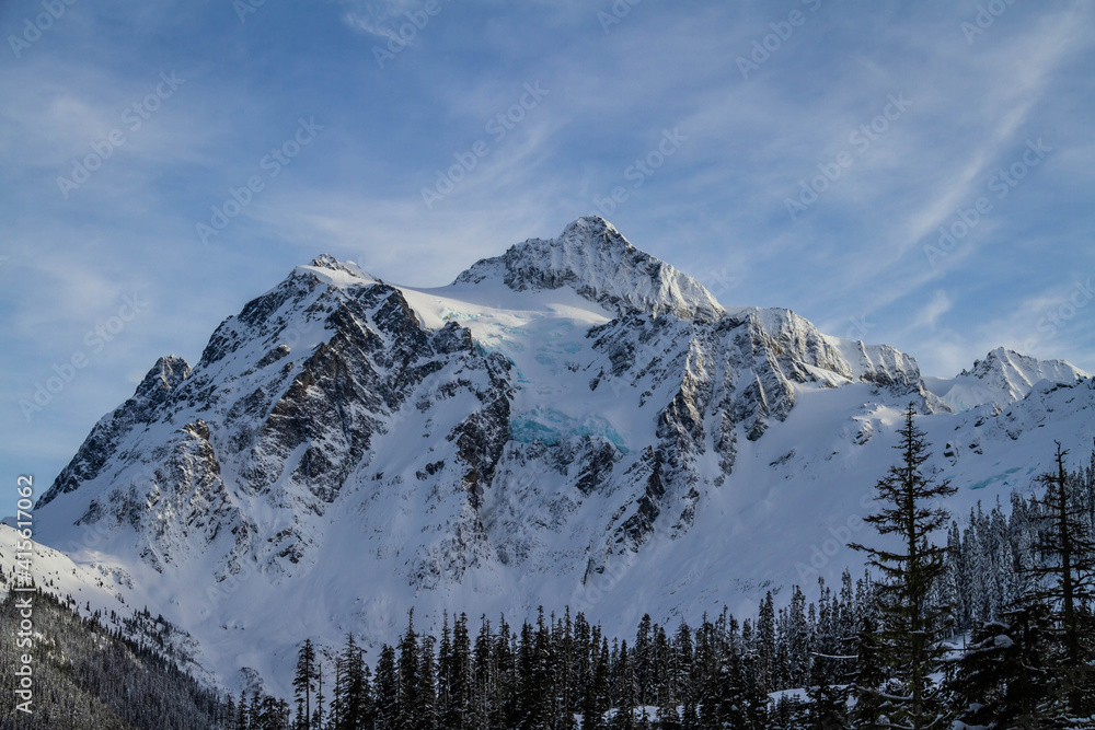 An image of Mt Shusksan in the North Cascade Mountains covered in snow. An image of Mt Shusksan in the North Cascade Mountains covered in snow.