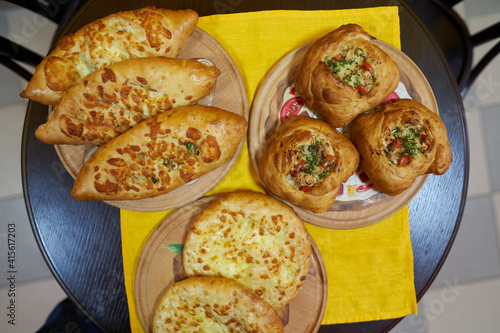 Puff pastry pies with spinach and cheese. vegetarian street food