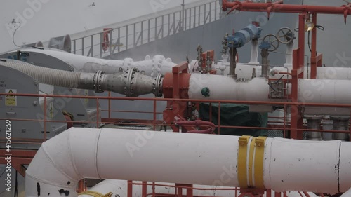 Flange connection with hoses for transfer LNG on cargo manifold of tanker ship