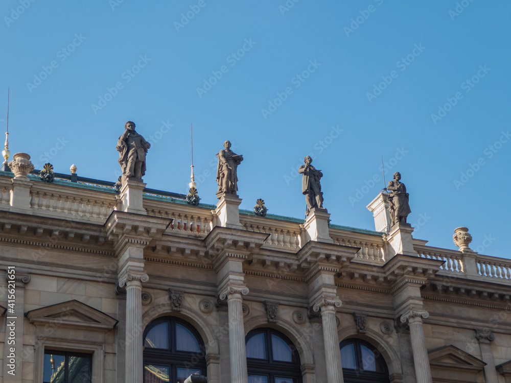 Statues on the facade of a building in Prague