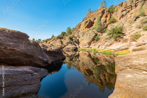Lake Bear Gulch and rock formations in Pinnacles National Park in California  the ruined remains of an extinct volcano on the San Andreas Fault. Beautiful landscapes  cozy hiking trails for tourists
