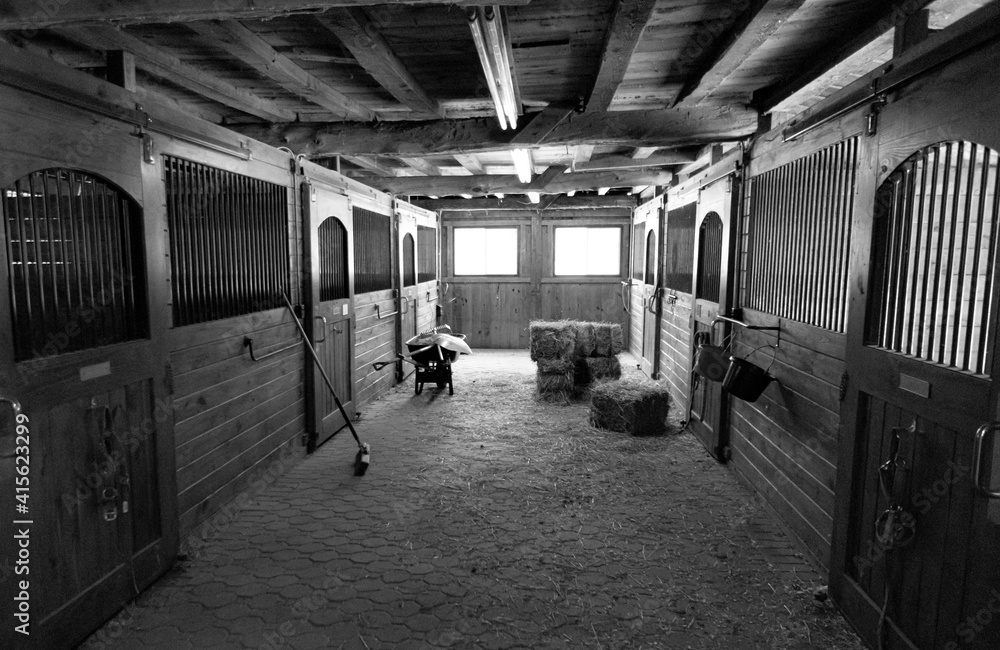Peaceful barn with haystacks and tools Peaceful barn with haystacks and tools