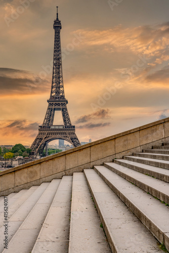 Eiffel Tower in Paris France, from the steps of The Trocadero at sunrise in summer postcadr background image © Chris