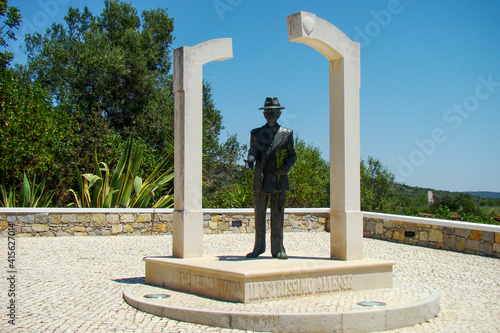 Statue of José Cavaco Vieira, in Alte, Loulé, Portugal photo