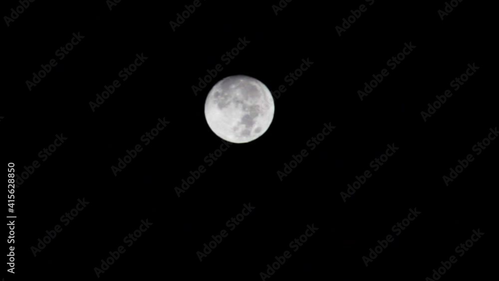 a clear view of the moon in motion at night a clear view of the moon in motion at night