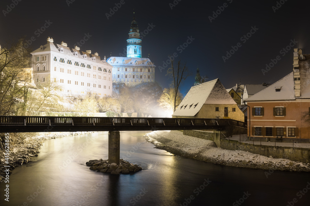 Panoramic view of Cesky Krumlov in winter season, Czech Republic. View of the snow-covered roofs. Travel and Holiday in Europe. Christmas time. Historical houses and streets. UNESCO World Heritage
