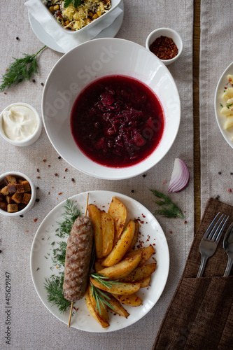 Borsch with sour cream and onions, lula with French fries