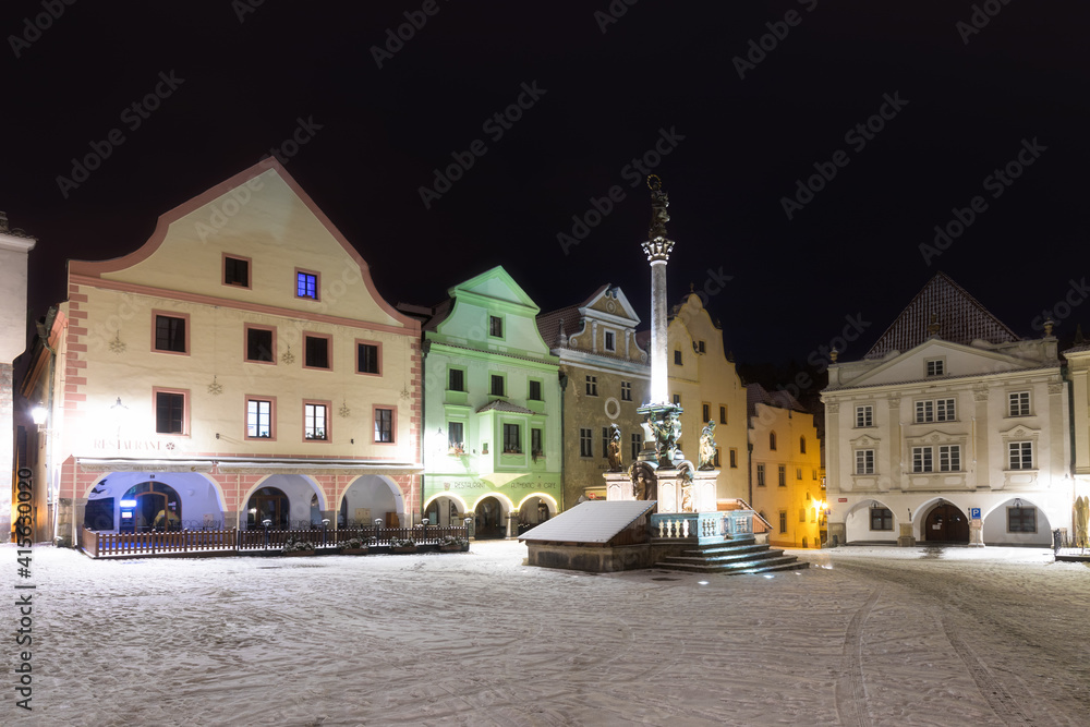 Panoramic view of Cesky Krumlov in winter season, Czech Republic. View of the snow-covered roofs. Travel and Holiday in Europe. Christmas time. Historical houses and streets. UNESCO World Heritage