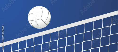 Volleyball court and net visible from the hill angle, volleyball ball standing on the line
