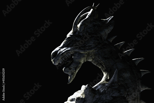 3d render illustration of ancient shaded fantasy dragon statue on dark background. © breakermaximus