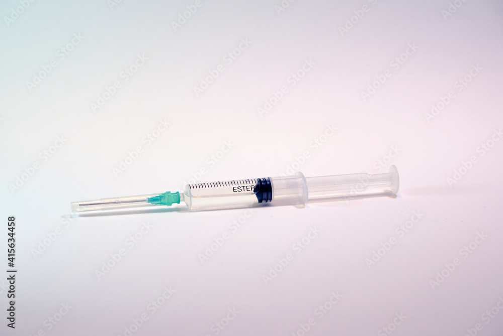 Syringe on a white background. Syringe on a white background.