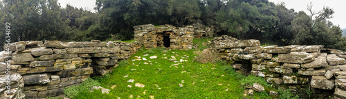 Dragon house at Euboea island, Greece. Dragon houses are old houses, built of massive stone blocks  without mortar and large stone slabs for the roof. photo