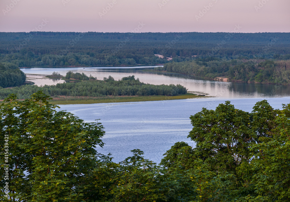 Dnipro river summer evening view from Taras Hill or Chernecha Hora (Monk Hill - important landmark of the Taras Shevchenko National Preserve, Kaniv, Cherkasy Region, Ukraine.