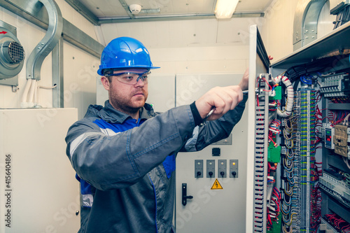 Canvas Print Energy and electricity, electromechanical protective at work with an electric pa