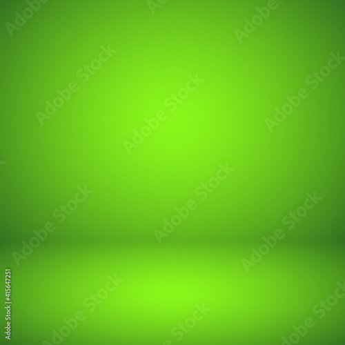 Empty green studio abstract background with spotlight effect. Product showcase backdrop. Chroma key compositing.