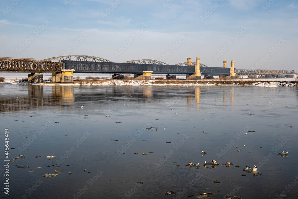 The historic bridge over the River Vistula in Tczew. Winter landscape..Poland, Europe. The historic bridge over the River Vistula in Tczew. Winter landscape..Poland, Europe.